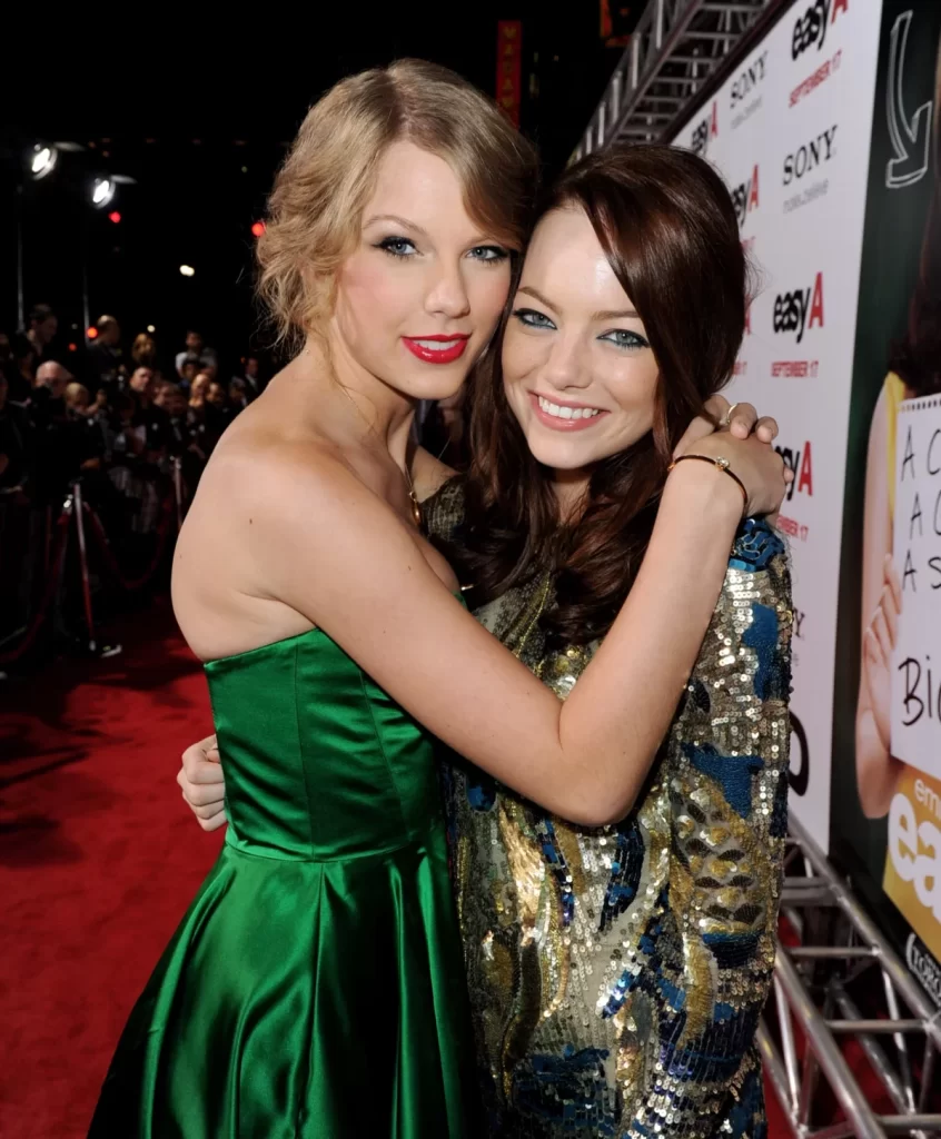 watch-emma-stone-break-into-song-at-taylor-swift’s-eras-tour-launch-concert