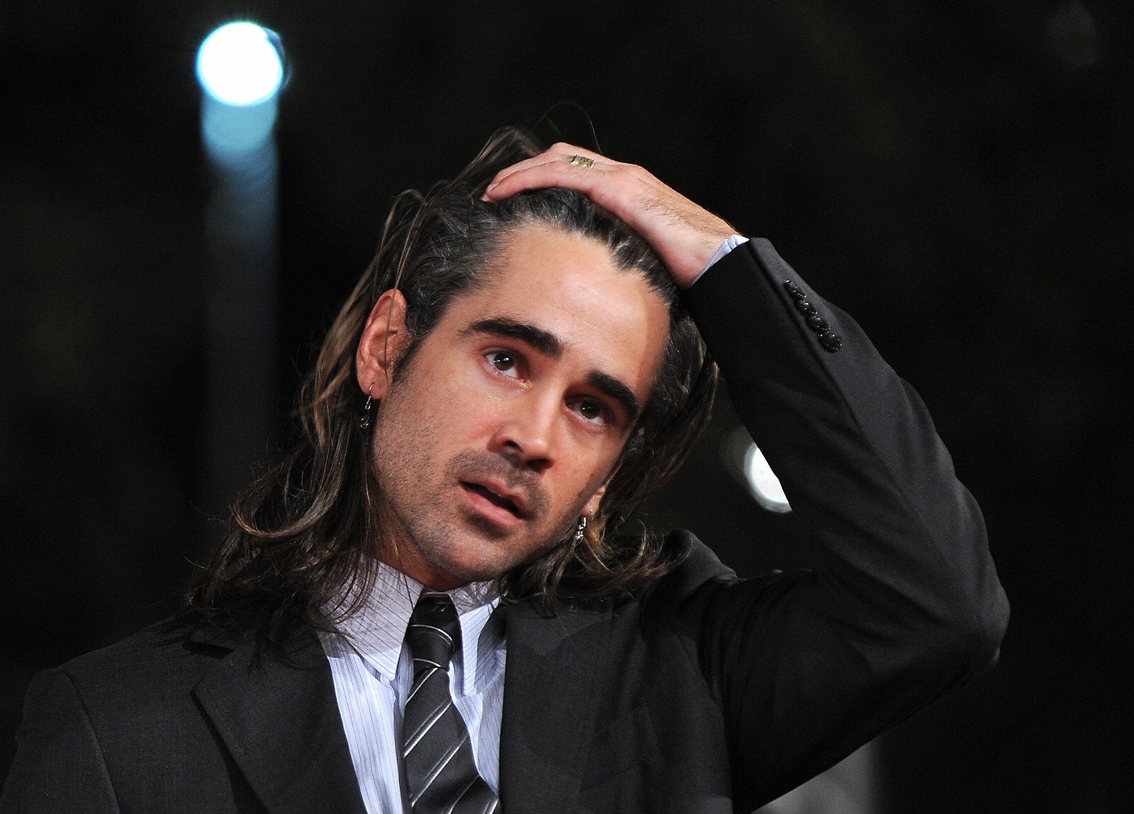 Irish actor Colin Farrell poses on the red carpet as he arrives to present the movie 