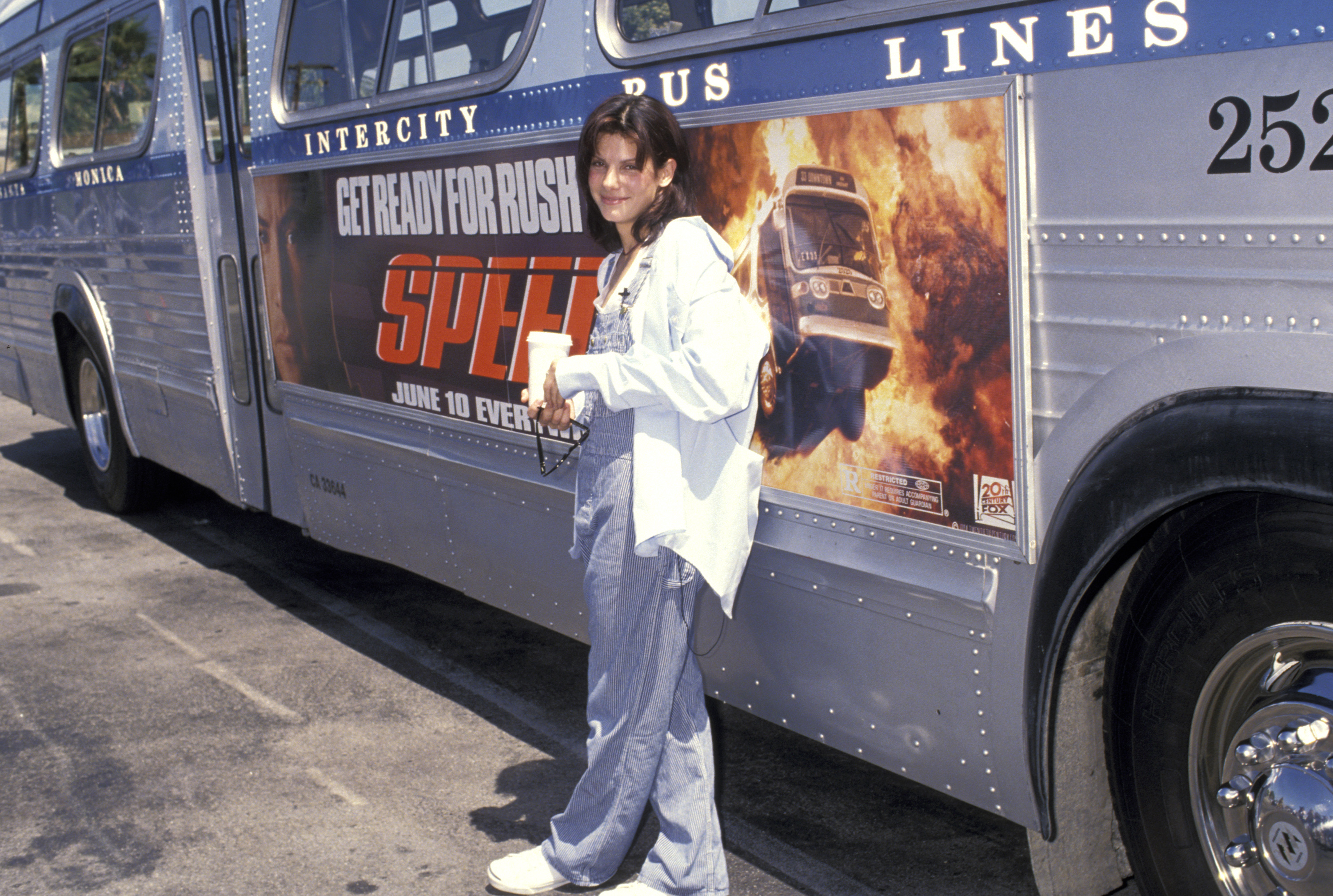 Sandra Bullock taking a bus driver test for the "Speed" promotion at Santa Monica Bus Lines on June 1, 1994 | Source: Getty Images