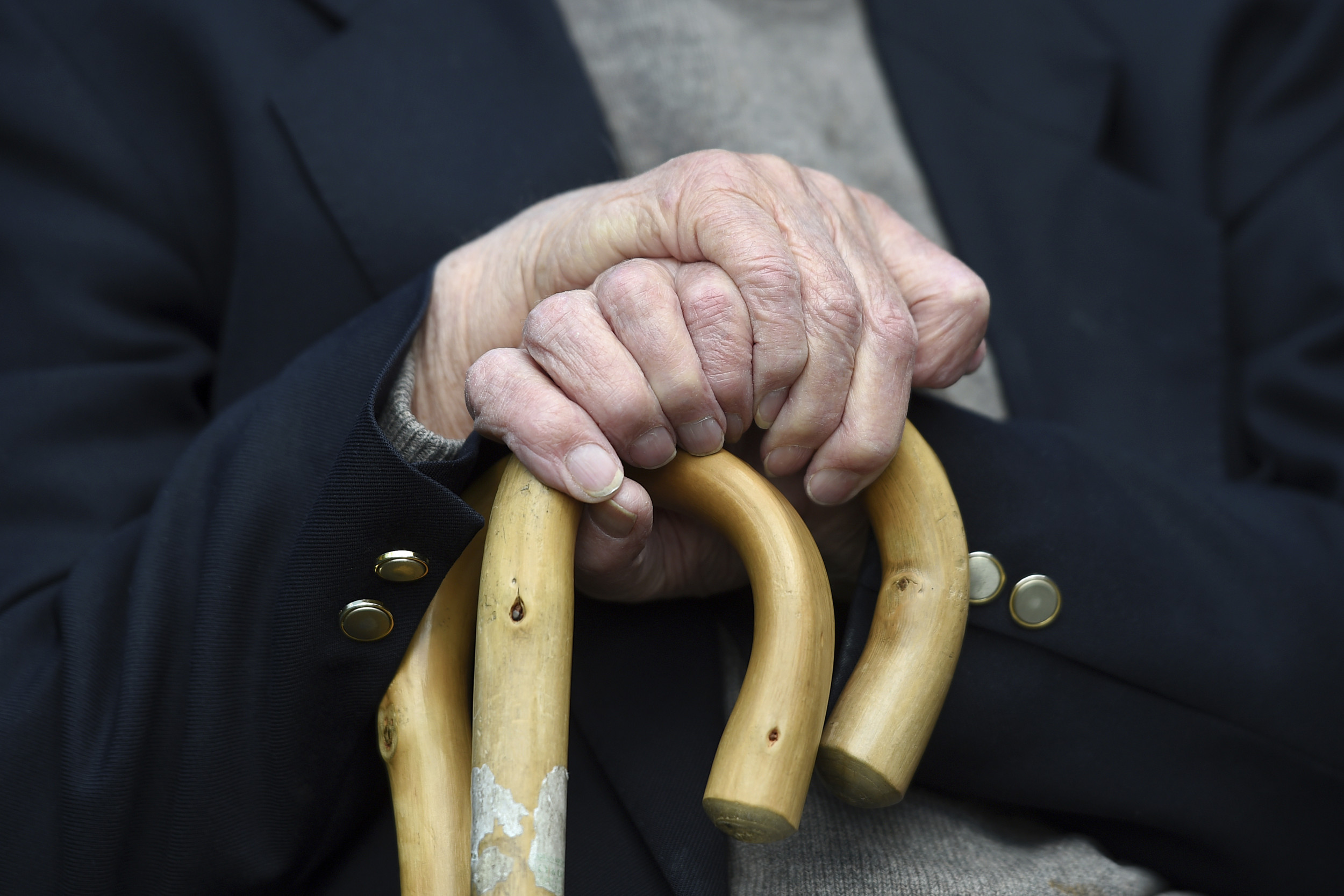 An elderly man in a retirement home