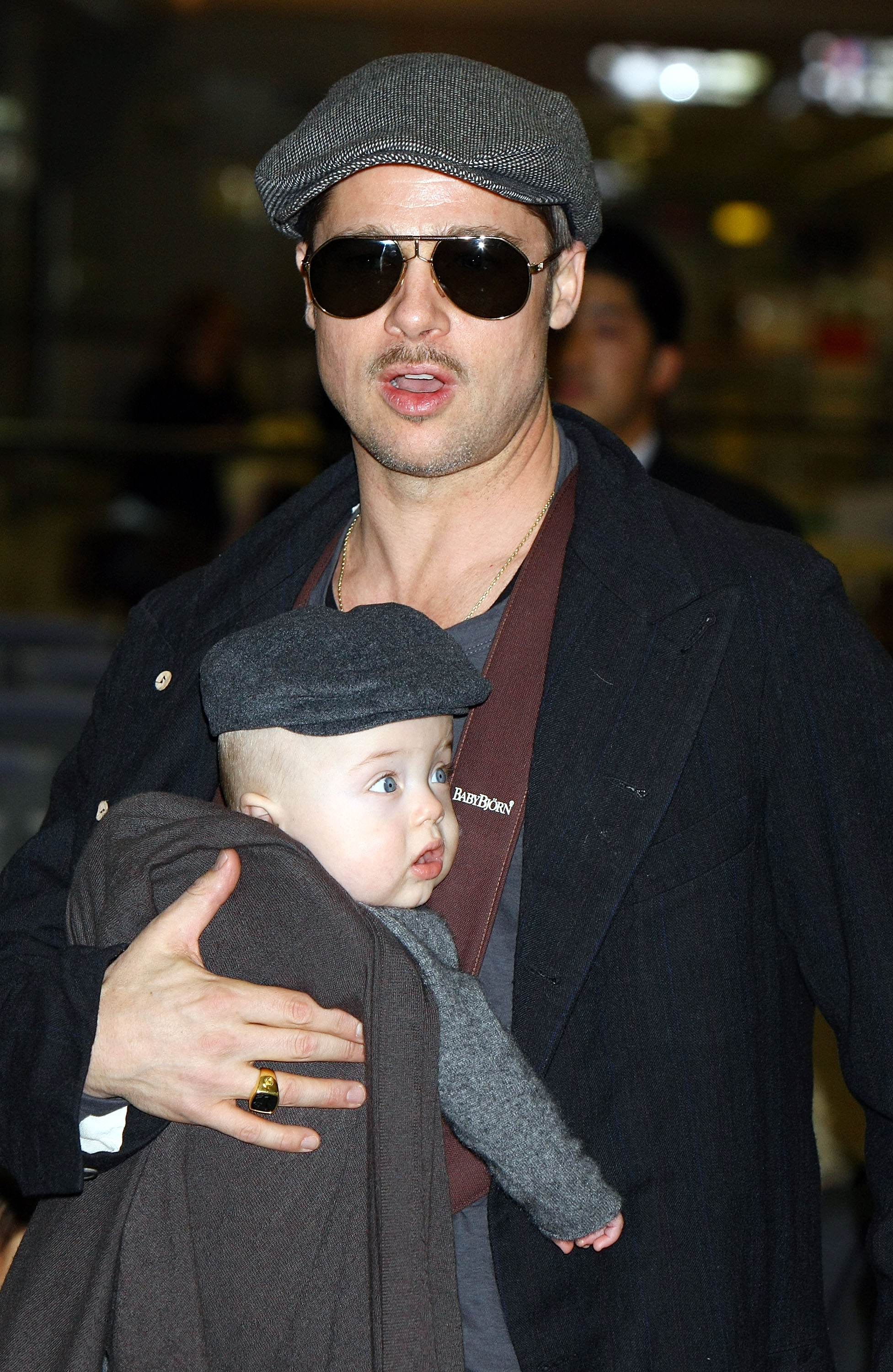 Brad Pitt and Knox Jolie-Pitt photographed at Narita International Airport on January 27, 2009, in Narita, Chiba, Japan | Source: Getty Images