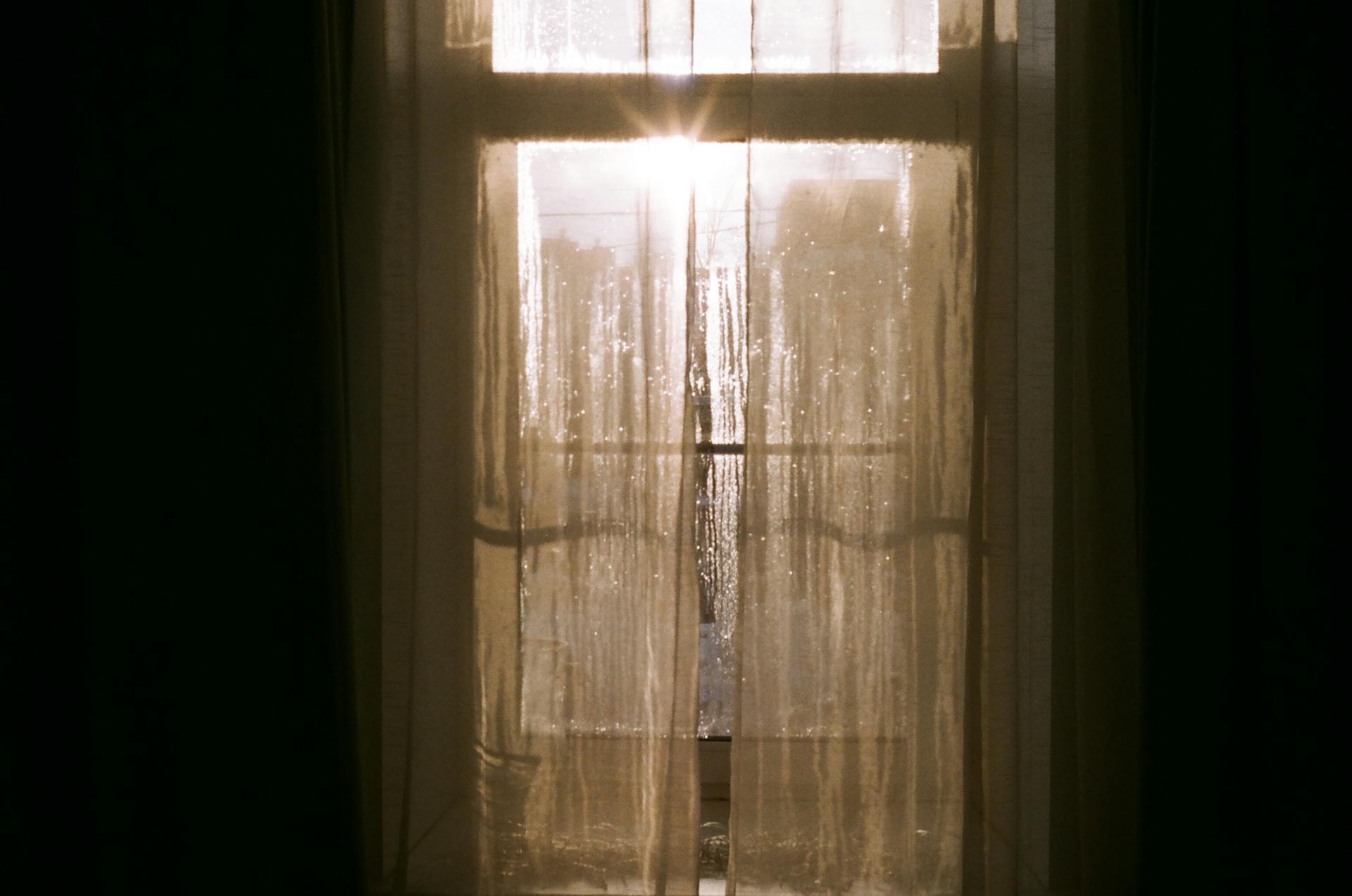 Sunlight passing through curtains | Source: Pexels