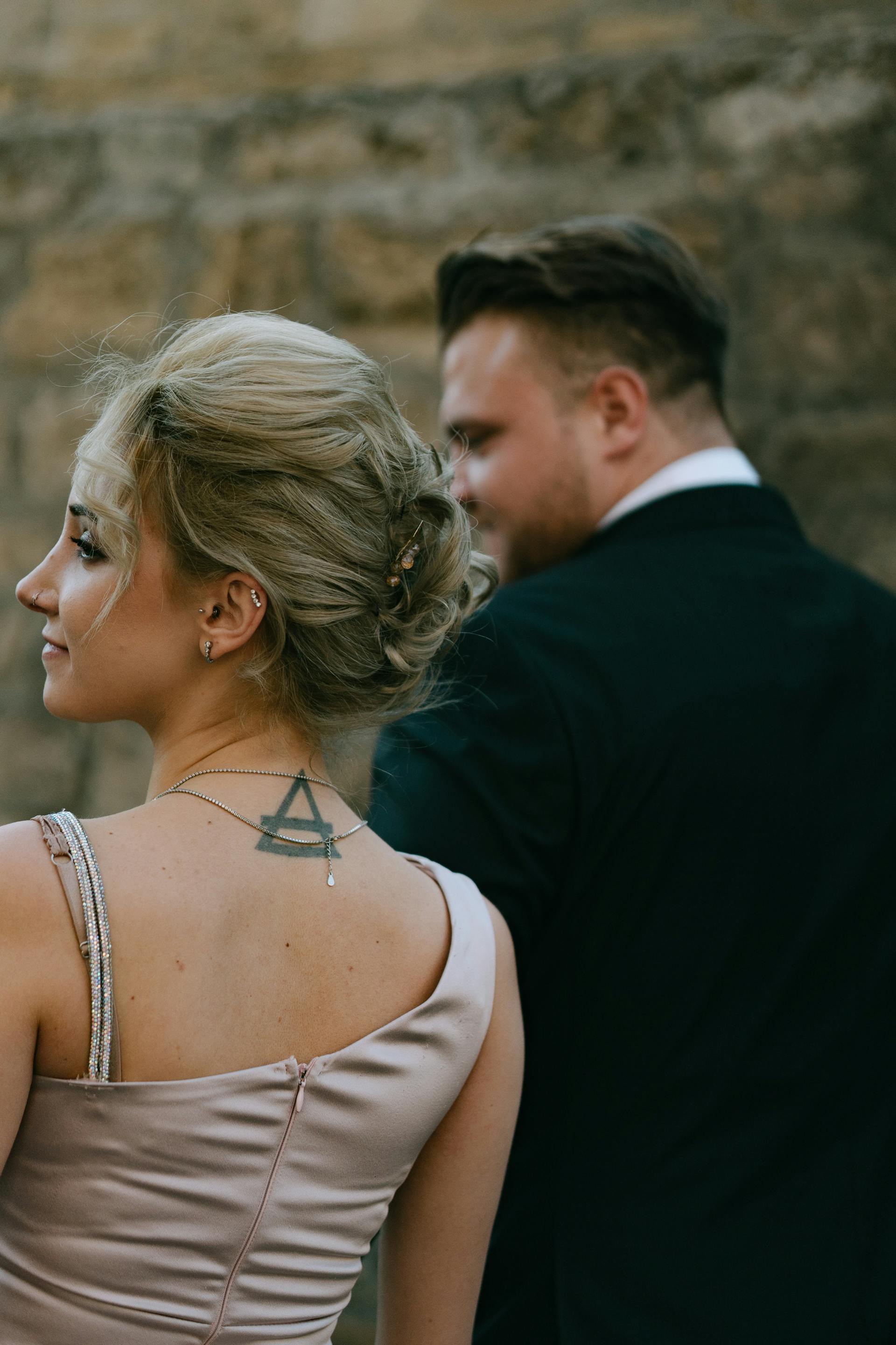 A couple in formalwear | Source: Pexels