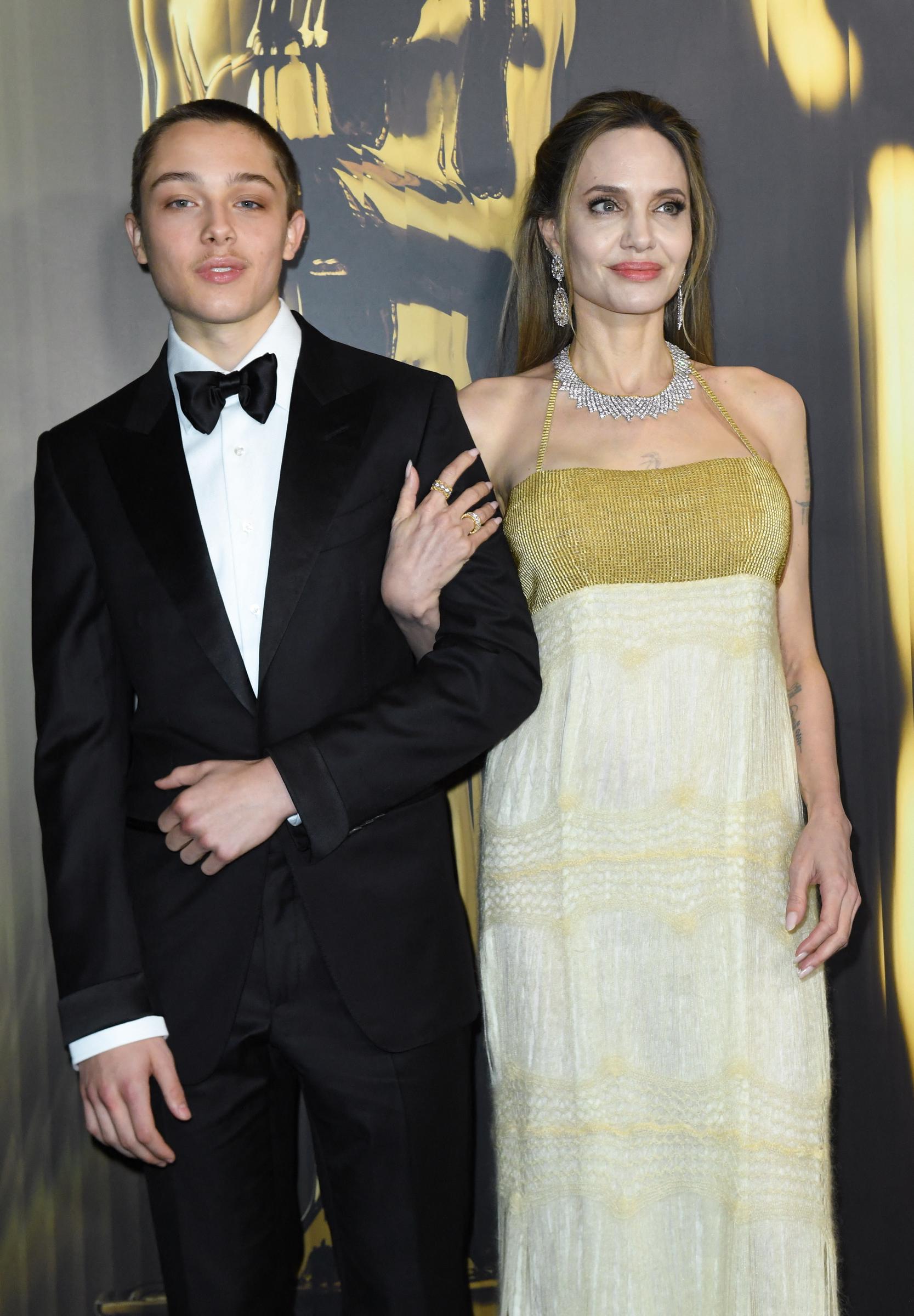 Knox Jolie-Pitt and Angelina Jolie at the 15th Governors Awards on November 17, 2024, in Los Angeles, California | Source: Getty Images