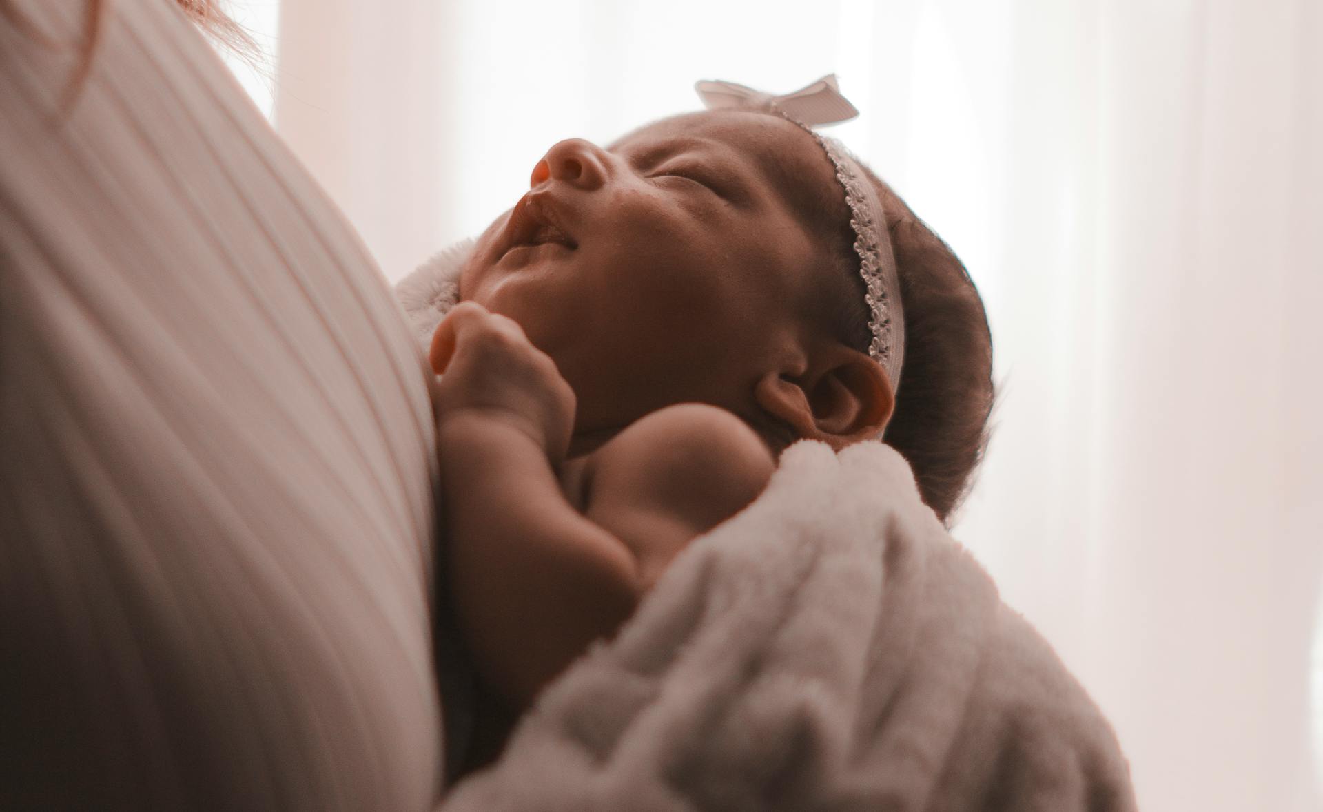 A newborn baby girl | Source: Pexels