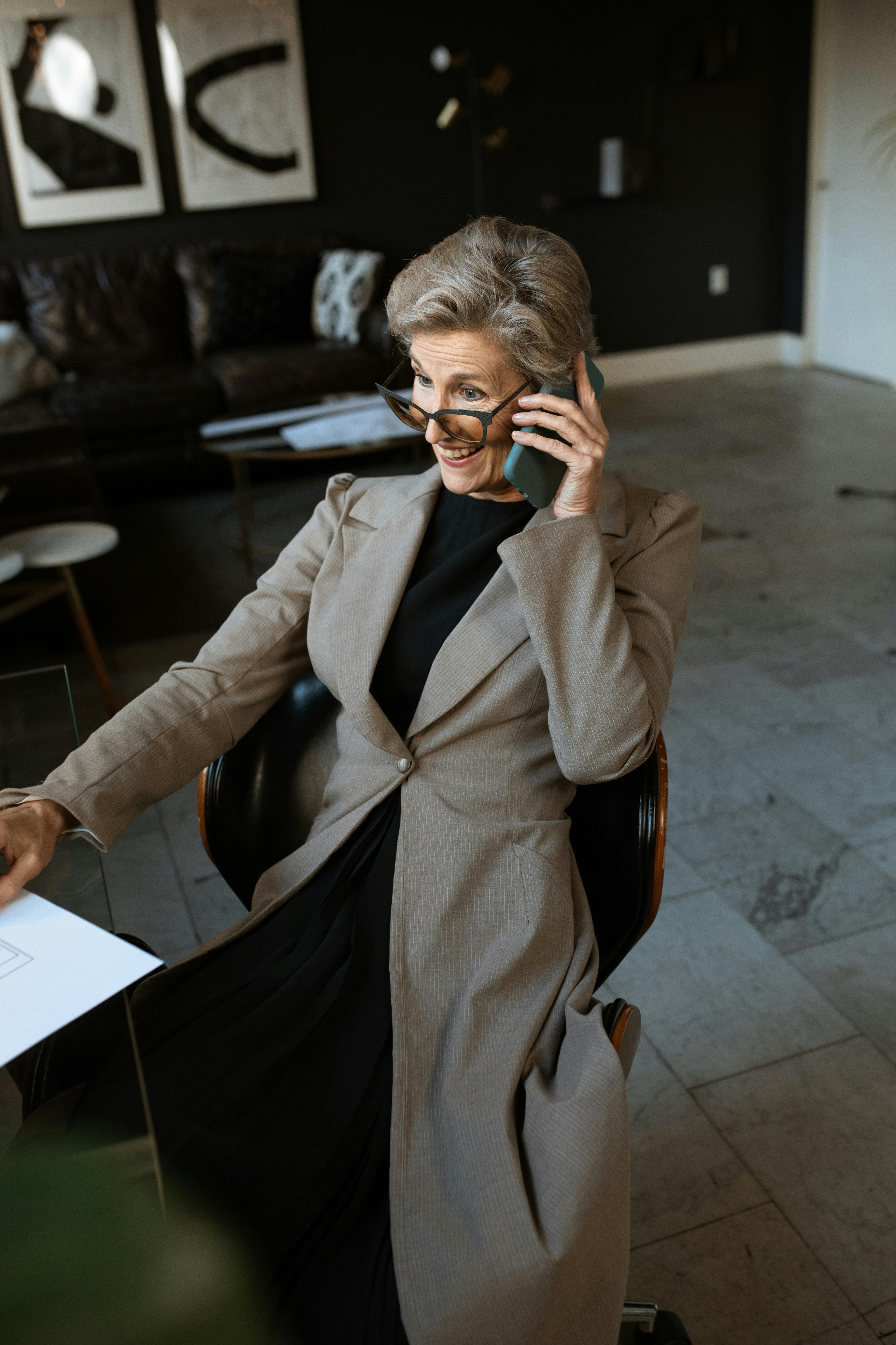 An excited woman on her phone | Source: Pexels