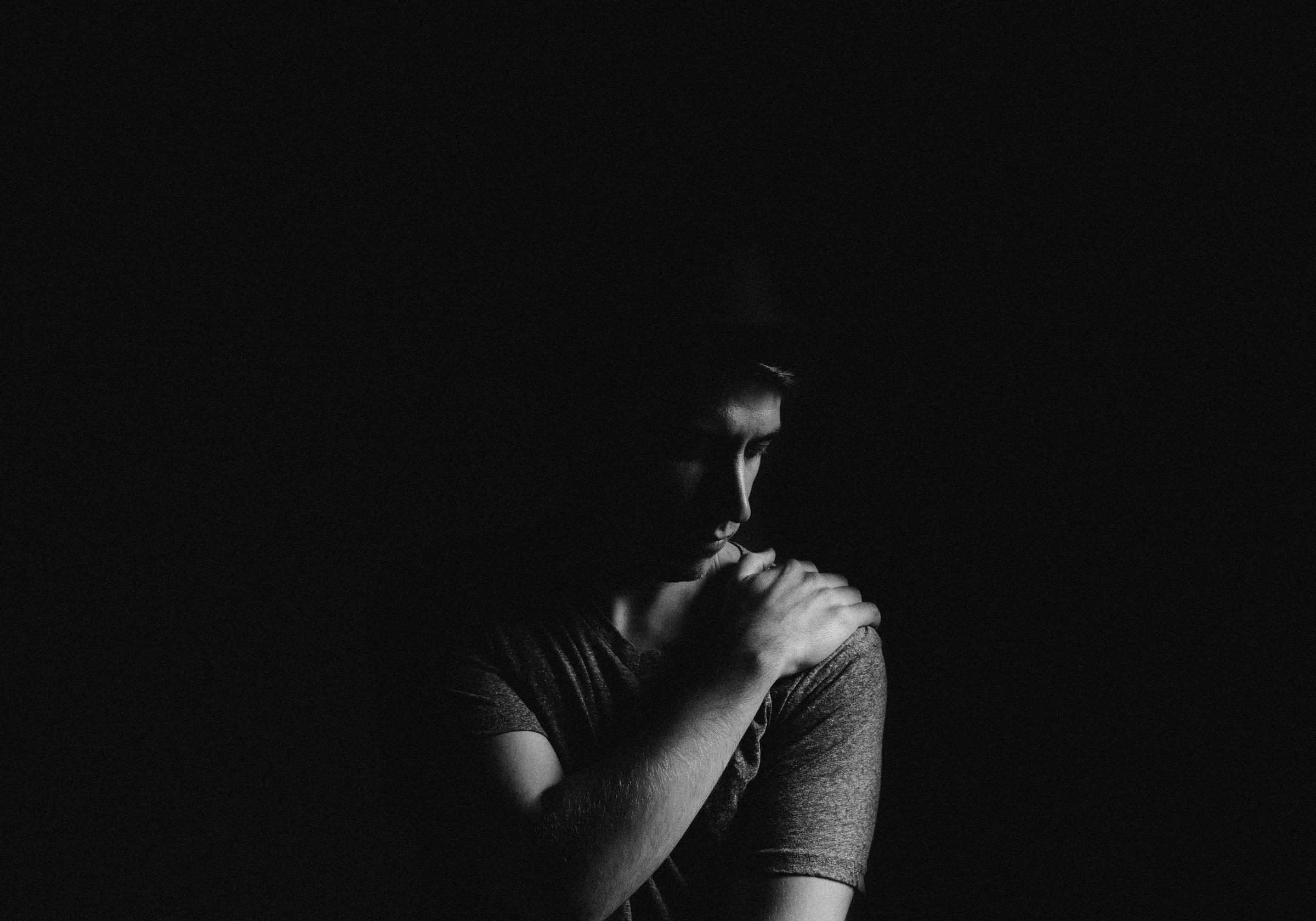 A man in the dark | Source: Unsplash