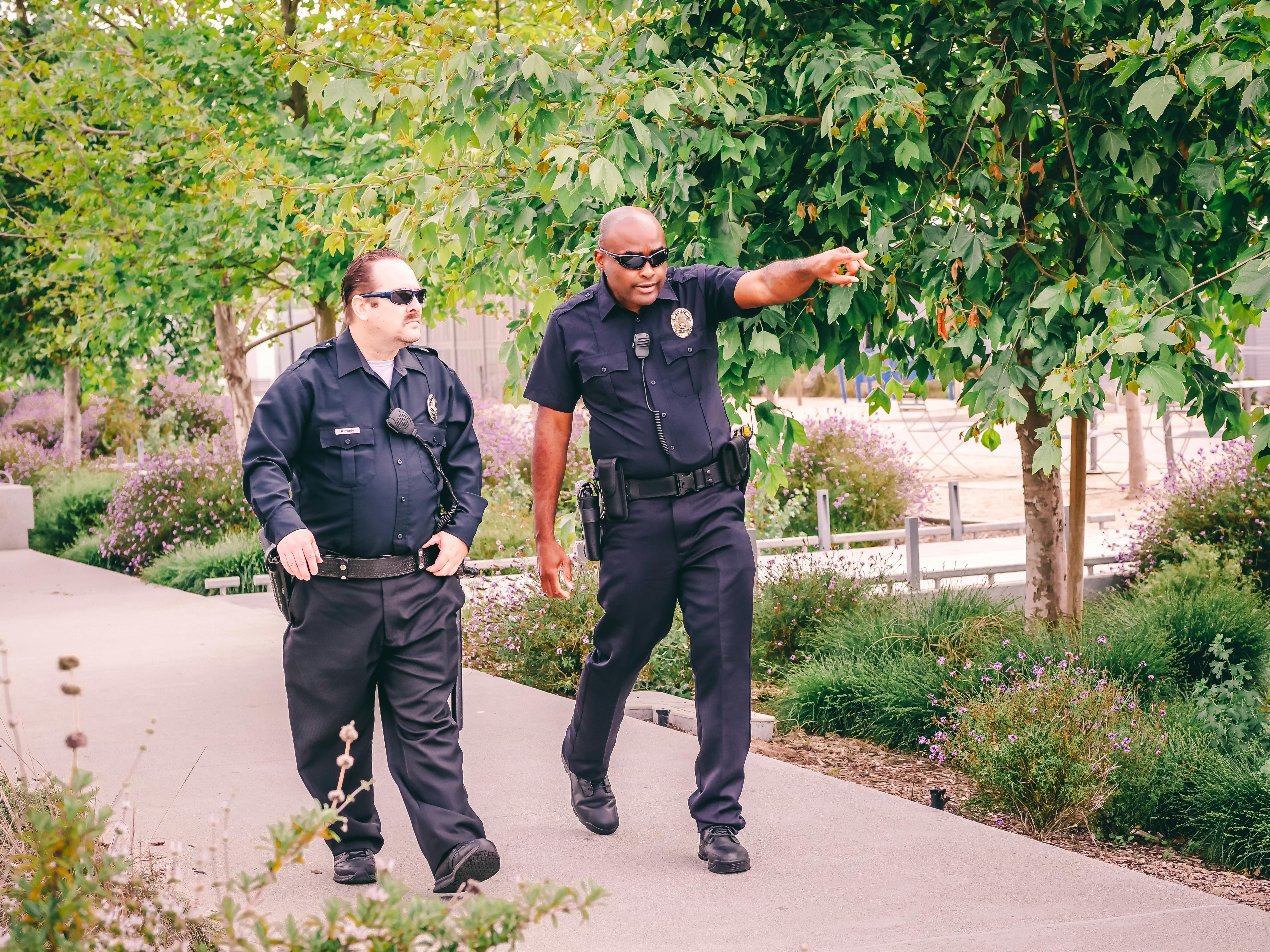 Two cops walking on the street | Source: Pexels