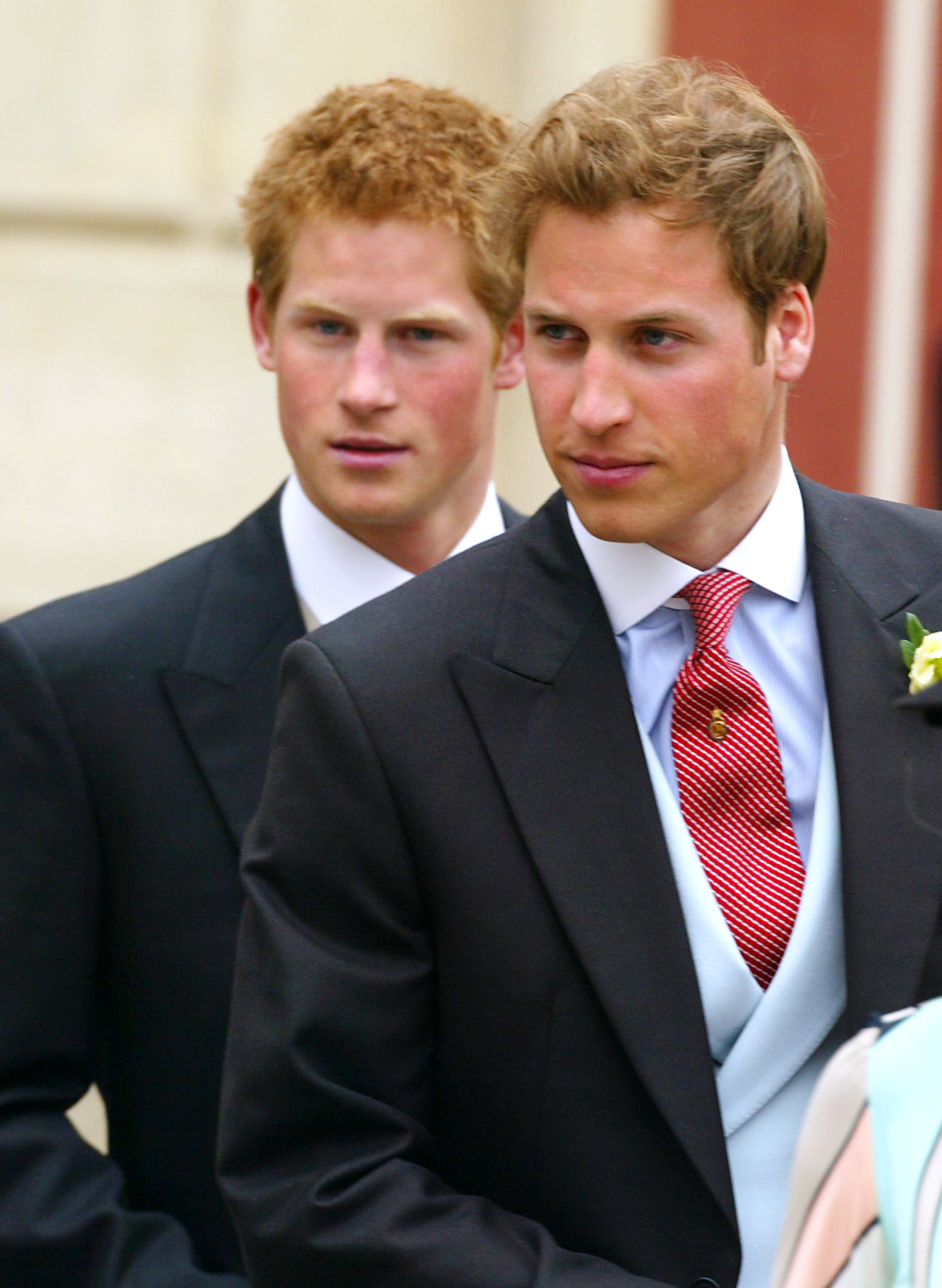 Prince Harry and Prince William after the civil wedding ceremony of their father the Prince of Wales, on April 9, 2005 | Source: Getty Images