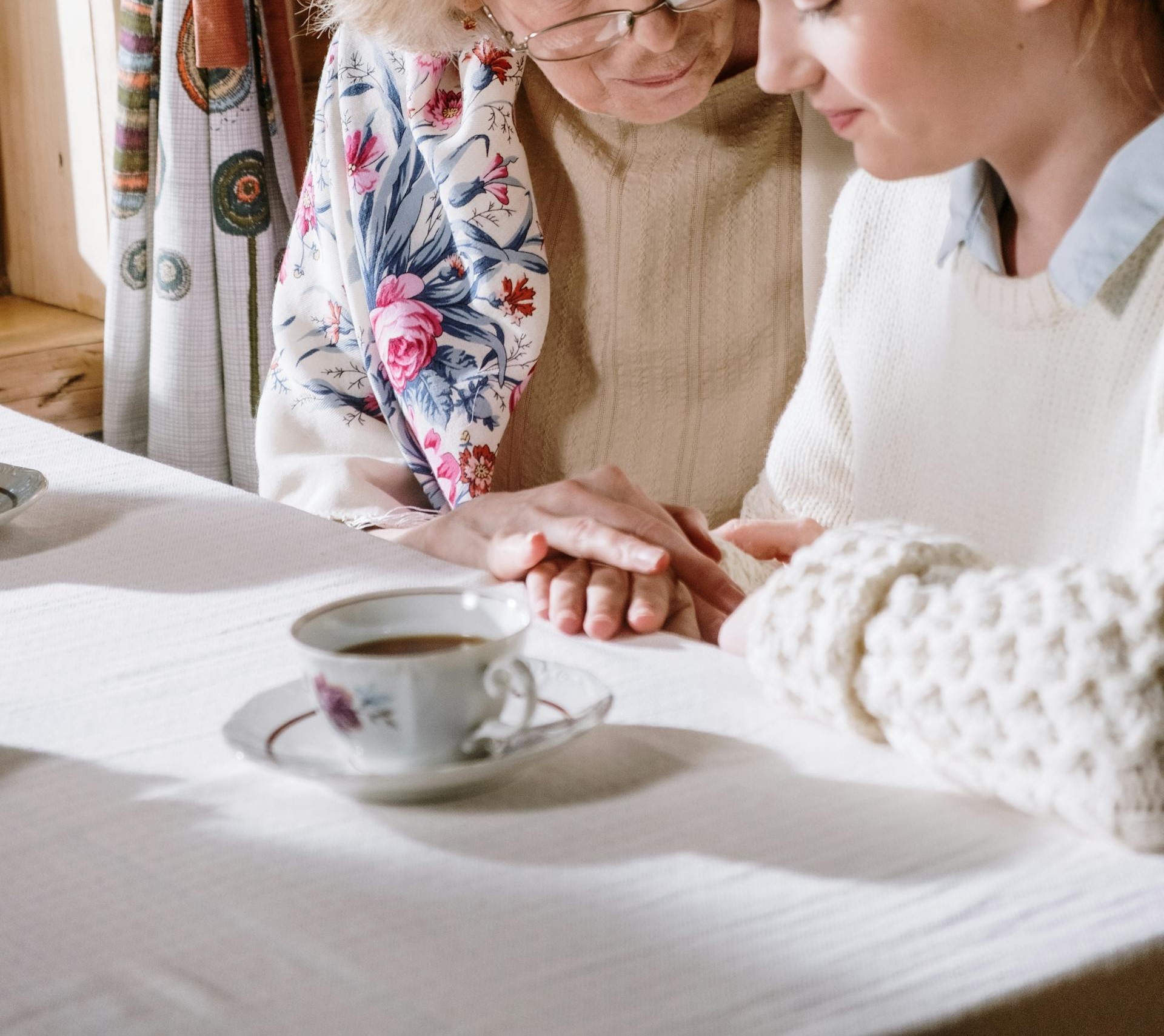 Close-up of an older woman talking to her granddaughter | Source: Pexels