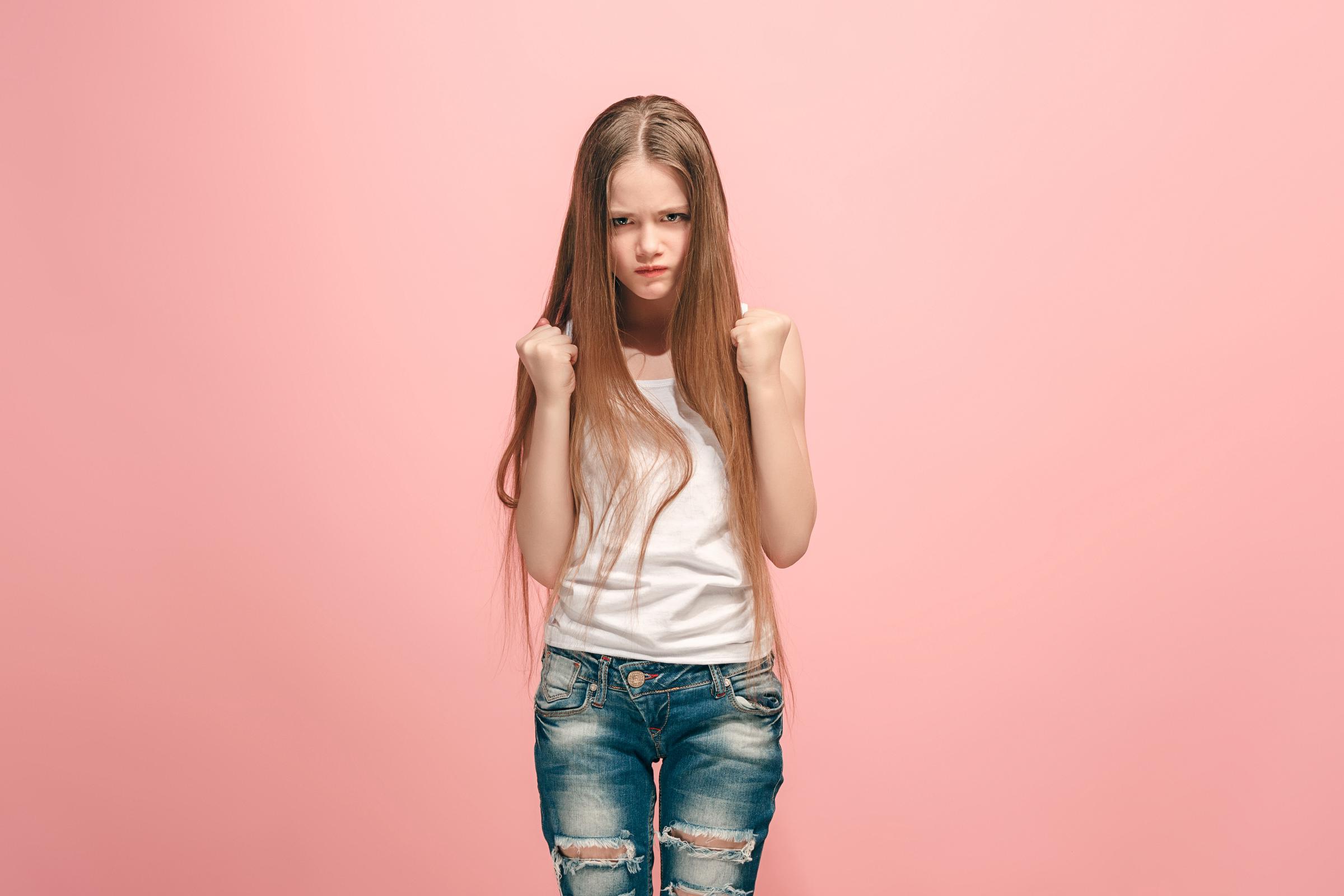 An angry teen girl | Source: Freepik