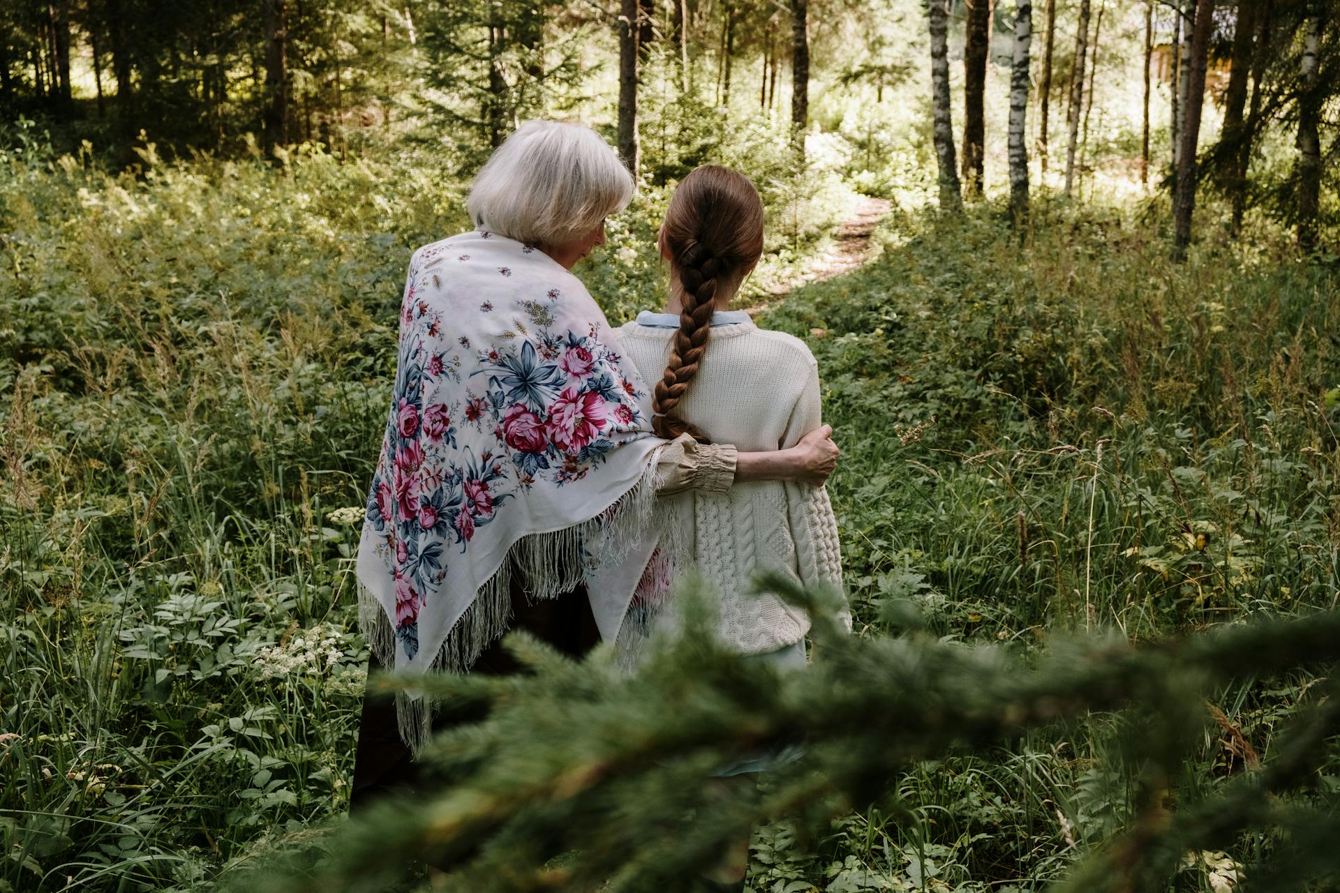 A teenage girl and her grandmother walking outdoor | Source: Pexels