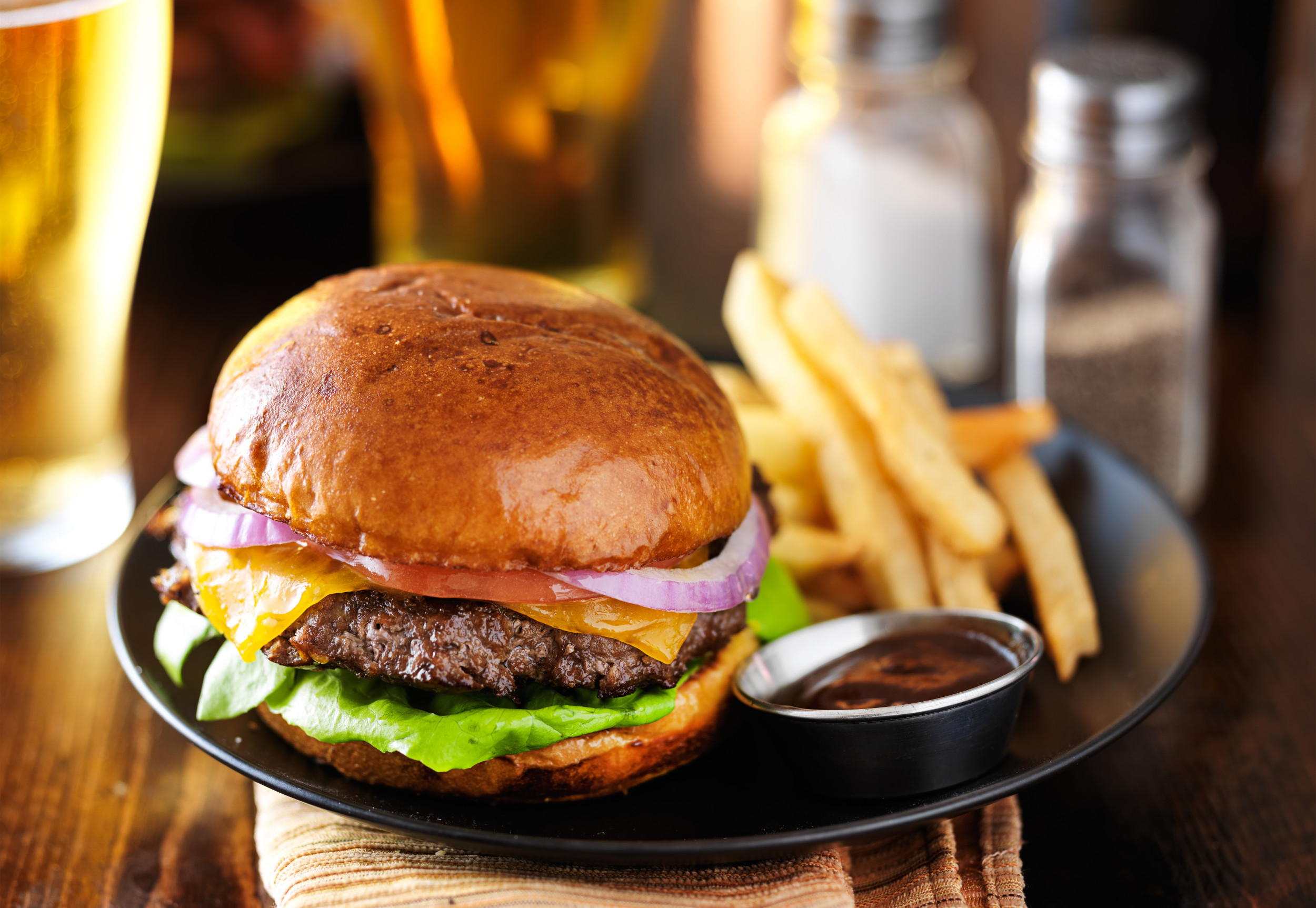 Burger And Fries Dish At Restaurant