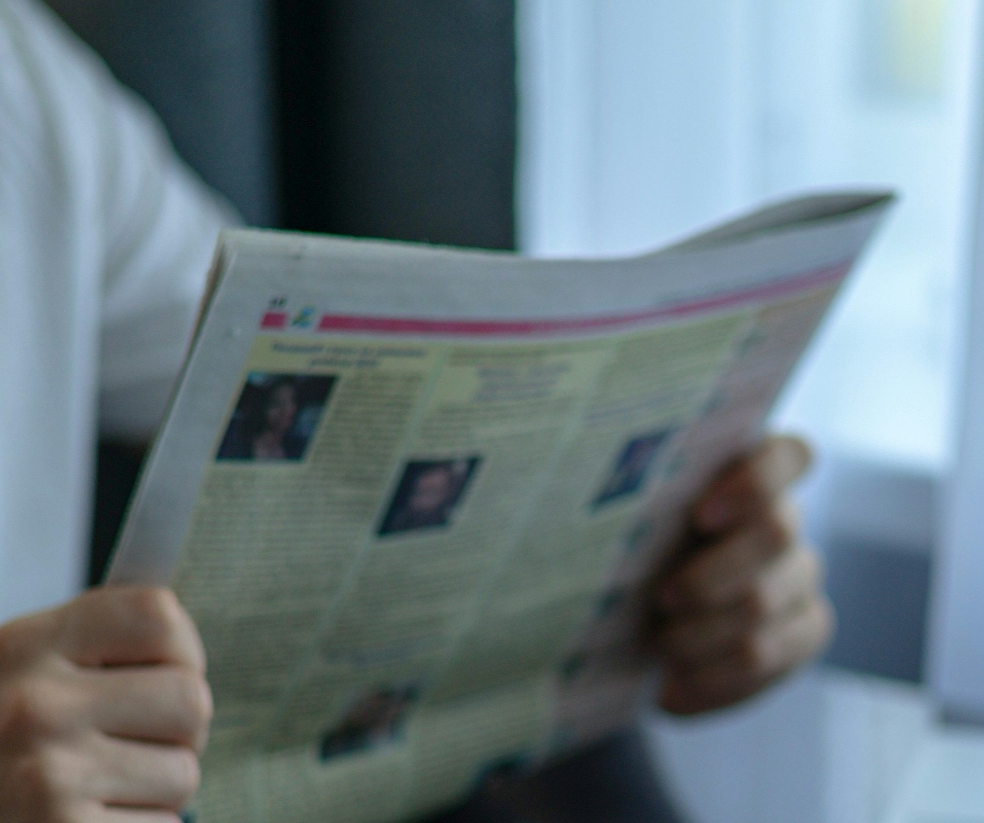 A person holding a newspaper | Source: Unsplash