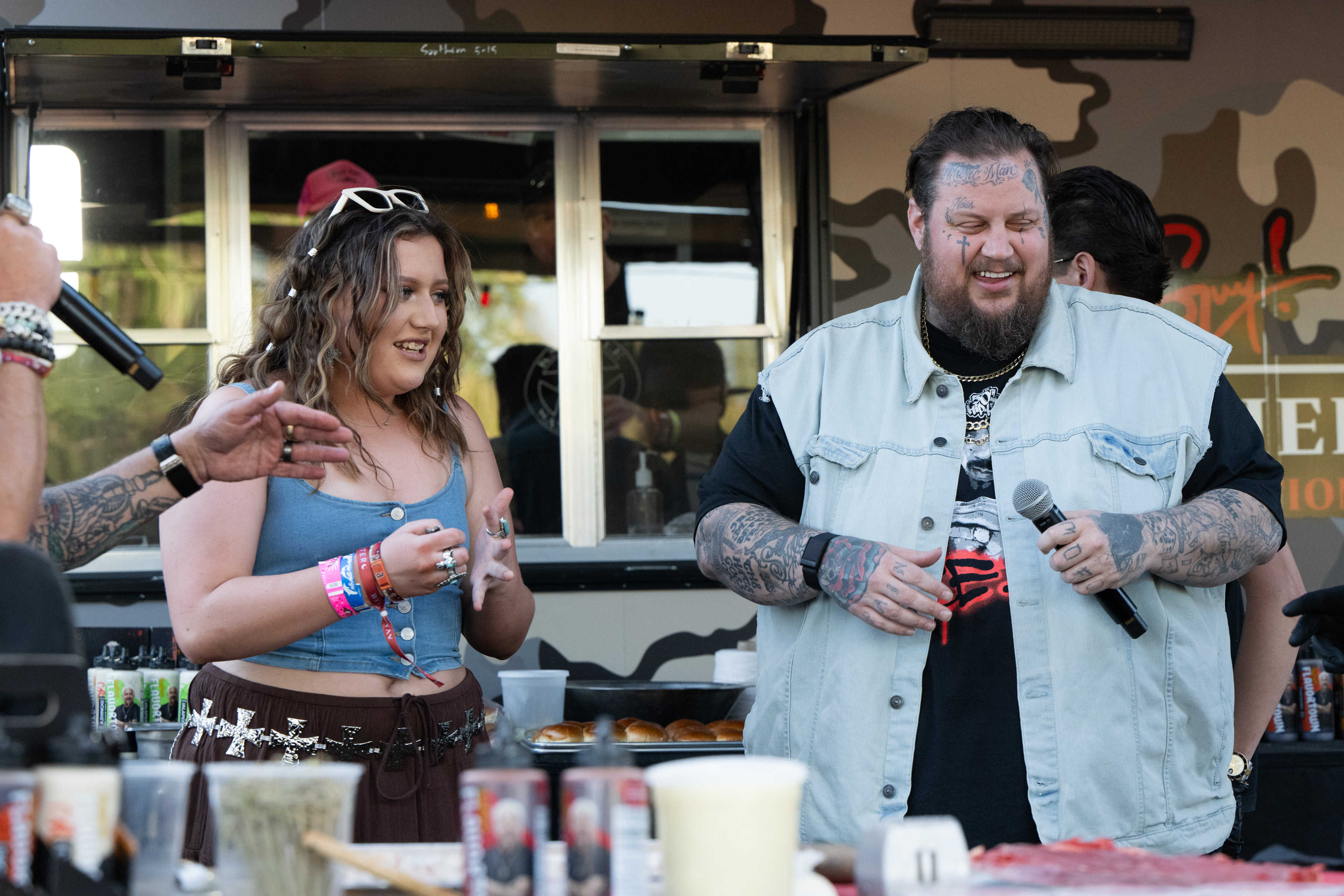 Bailee Ann DeFord and Jelly Roll attend Guy Fieri's Smokehouse on Day 1 of the Stagecoach Festival on April 26, 2024, in Indio, California. | Source: Getty Images