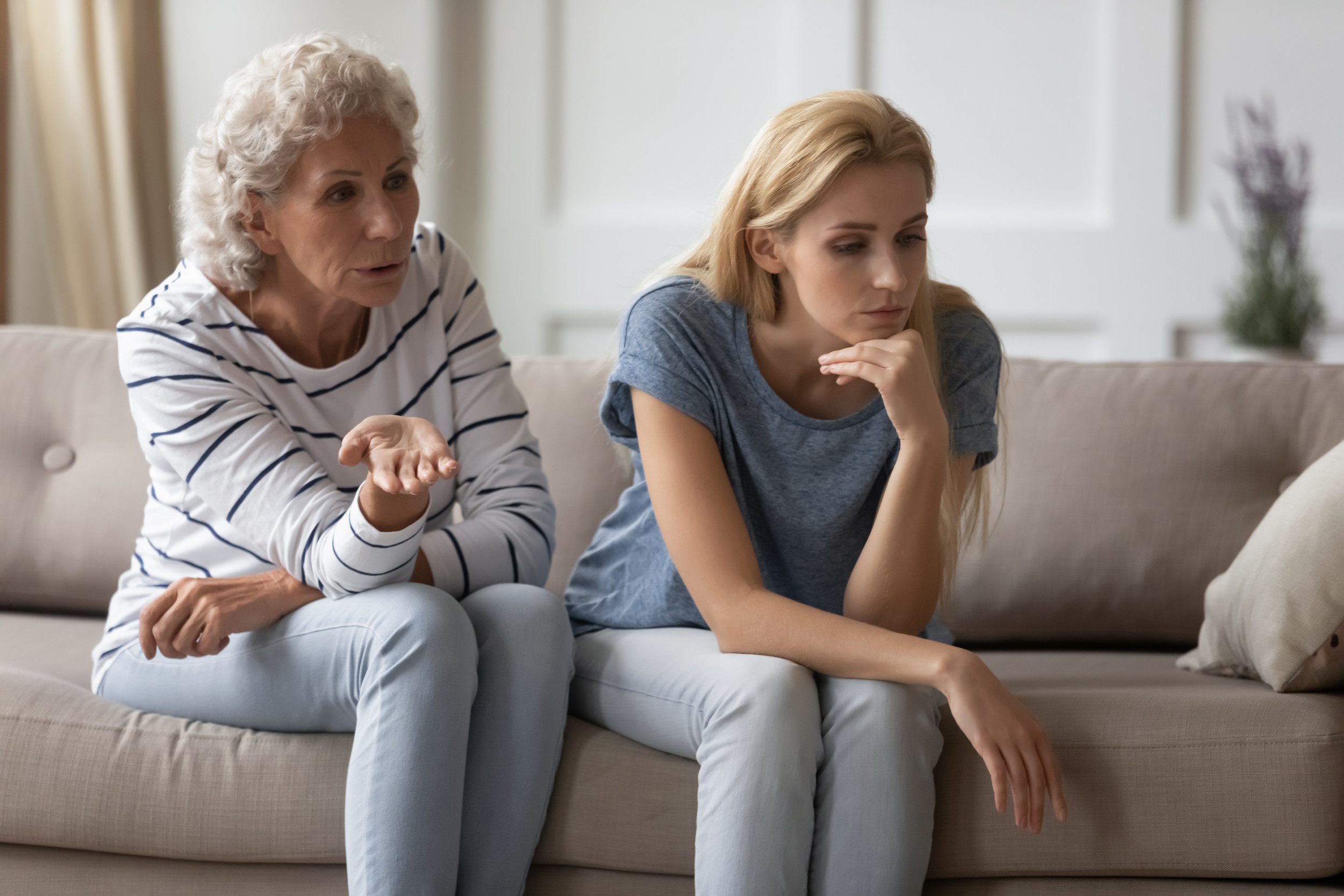 Unhappy daughter mother scolding