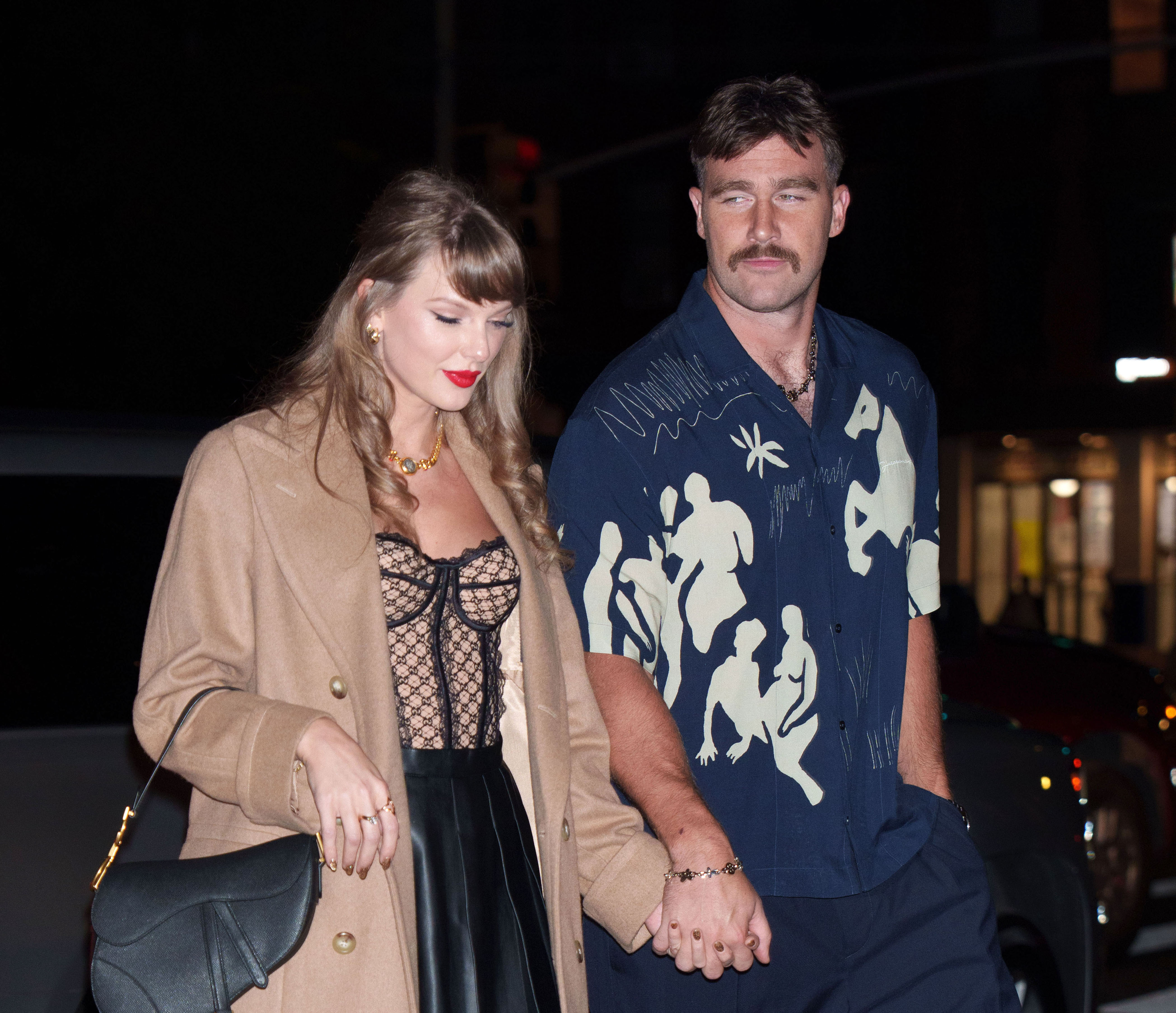 Taylor Swift and Travis Kelce are seen on October 11, 2024, in New York City | Source: Getty Images