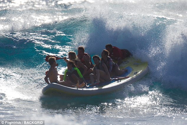 The waves: The lovebirds were joined by a group of fellow water lovers