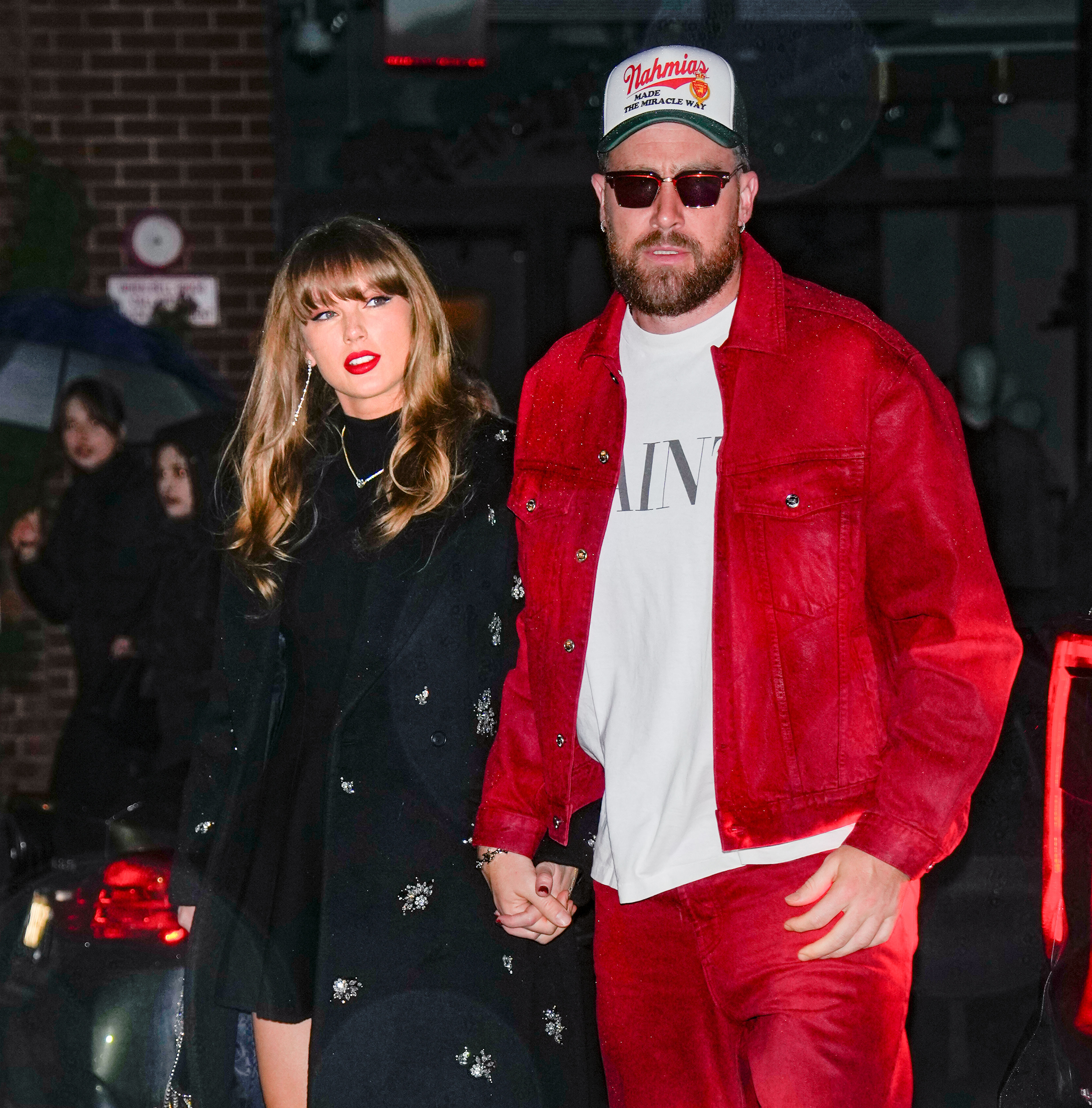 Taylor Swift and Travis Kelce are seen on December 28, 2024, in New York City | Source: Getty Images