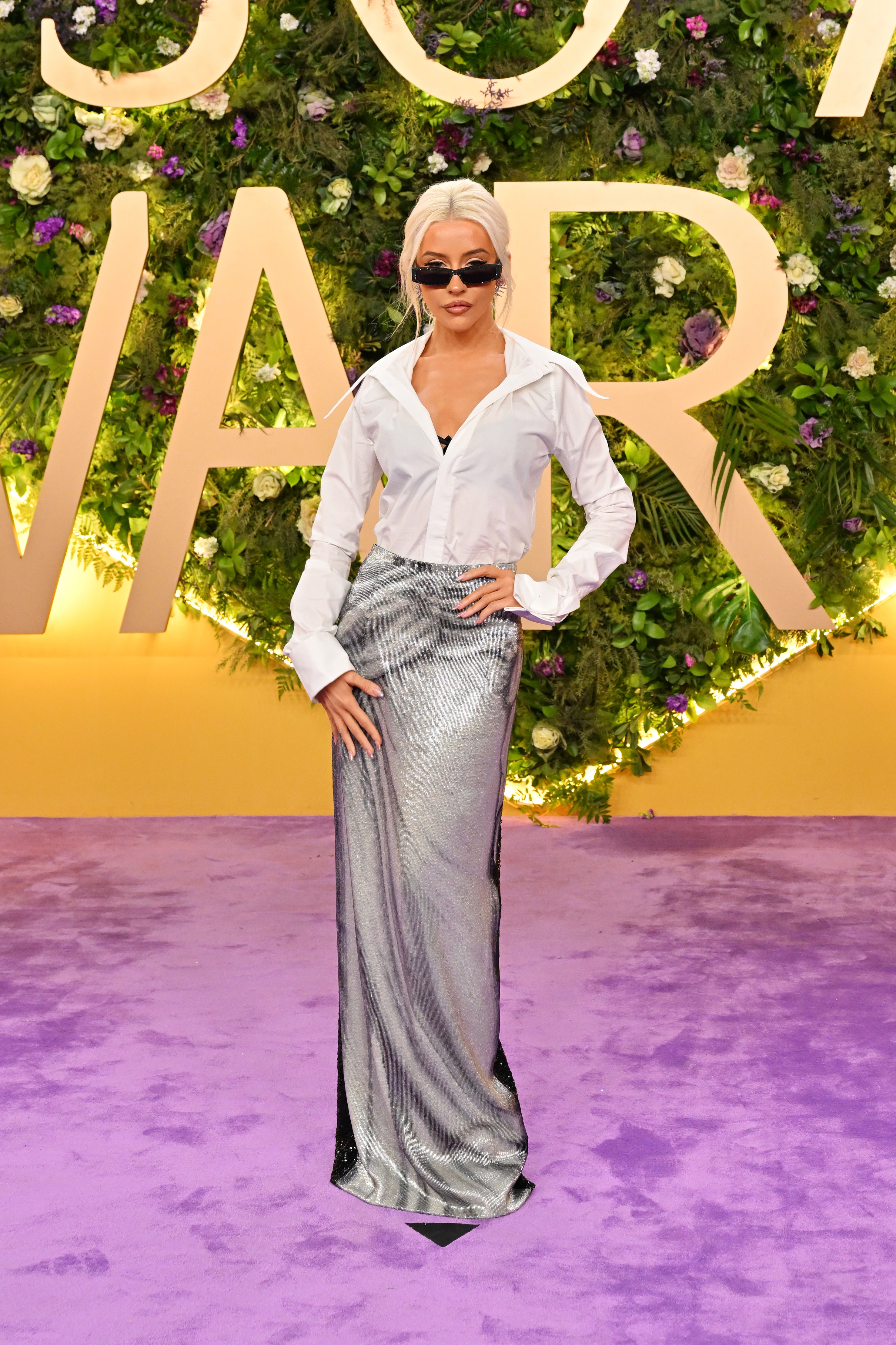 Christina Aguilera posing on the event's carpet. | Source: Getty Images