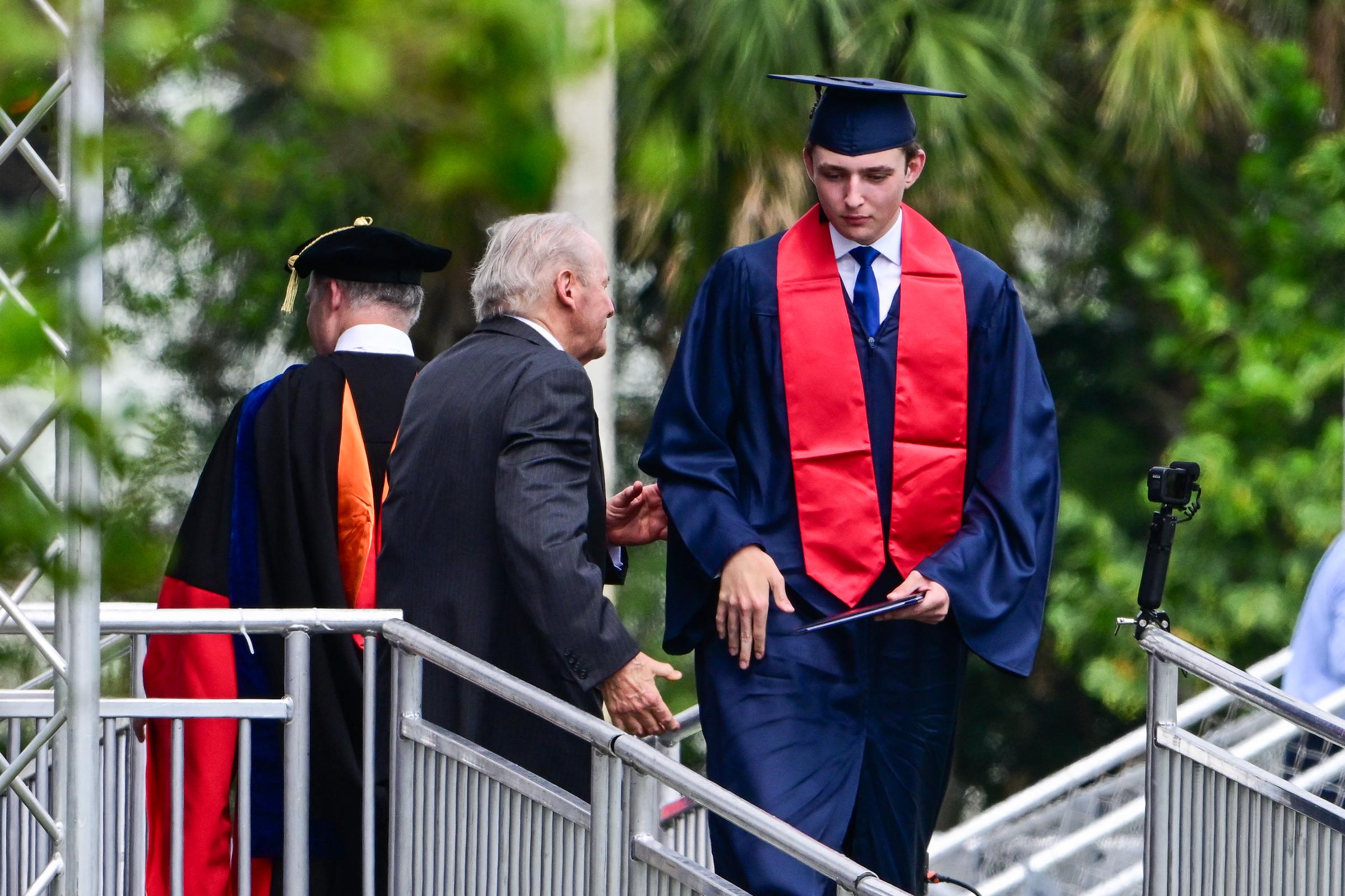 Barron Trump takes part in his graduation at Oxbridge Academy in Palm Beach, Florida, on May 17, 2024 | Source: Getty Images