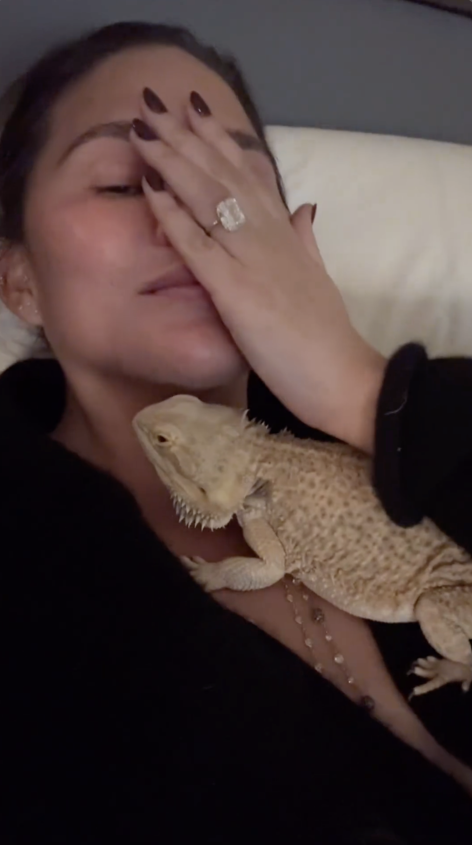 Chrissy Teigen's Instagram Story featuring her ring and her pet bearded dragon | Source: Instagram/pagesix