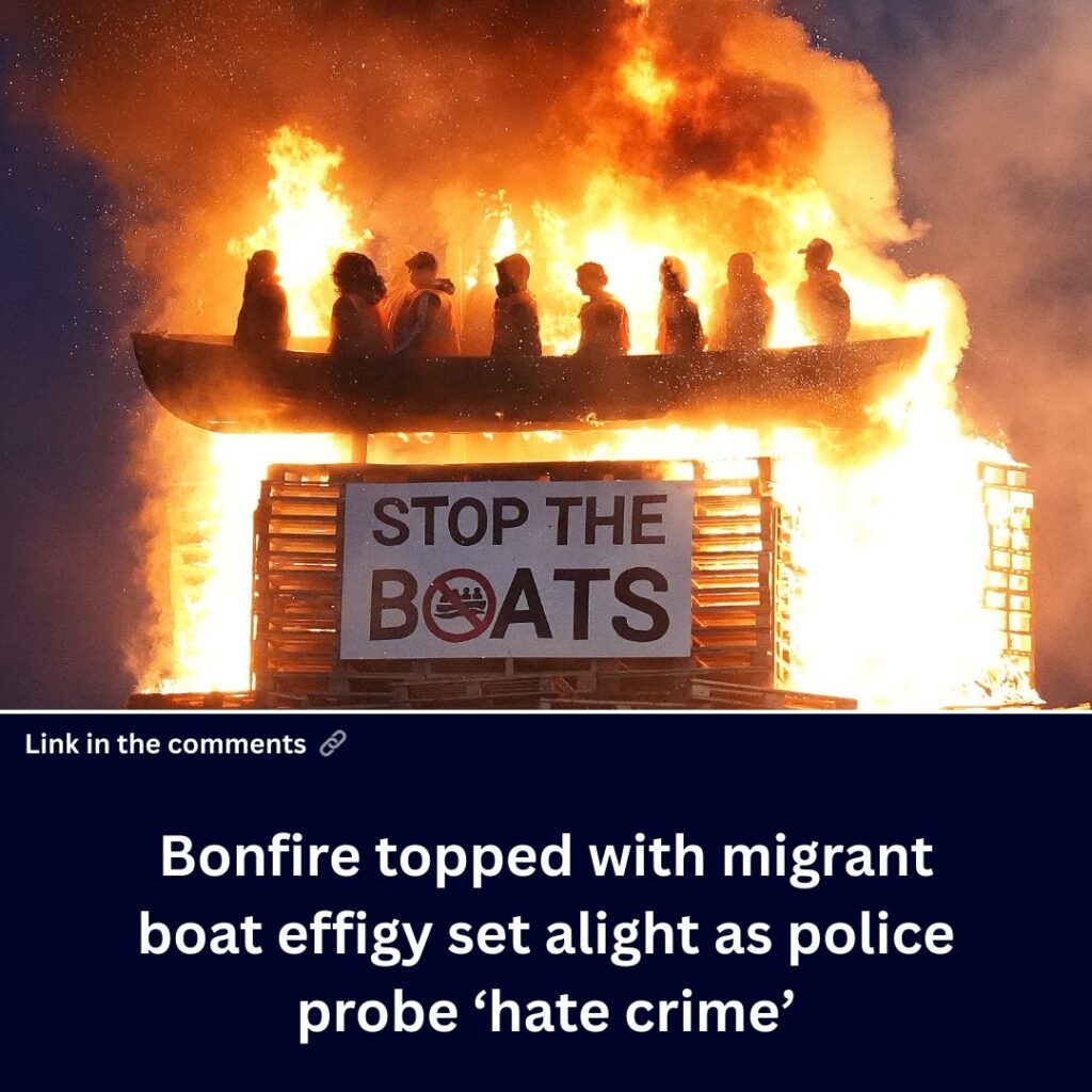 bonfire-topped-with-migrant-boat-effigy-set-alight-as-police-probe-hate-crime