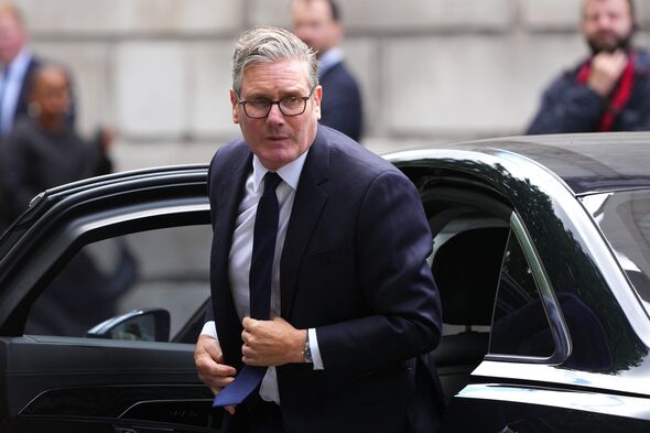 Keir Starmer exits a car