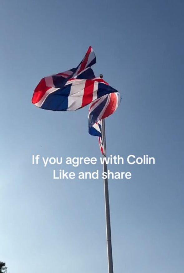 The larger flag flying in his back garden.